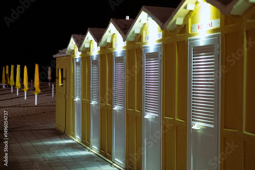 Yellow cabins on the sea beach
