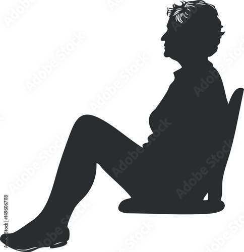 Silhouette of a woman sitting on a chair in profile view with legs crossed in a relaxed posture