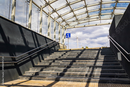 Stairs leading up from pedestrian crossing. Urban