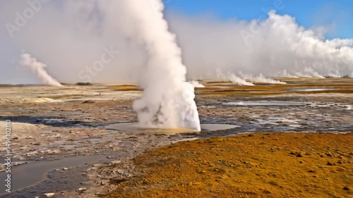 Wallpaper Mural Steaming geysers erupt in geothermal landscape with mud pools and fumaroles, creating a dramatic and otherworldly scene Torontodigital.ca
