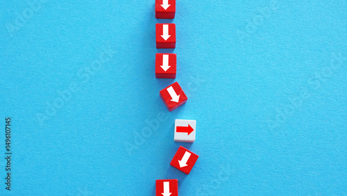 Independent thinking and nonconformity. One arrow in opposite direction among many.
