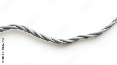 A gray electricity cord stretched across a white background, featuring a smooth insulated surface and visible plug ends.
