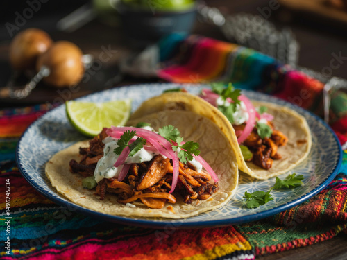 Jackfruit Tacos: Shredded jackfruit in smoky BBQ sauce, stuffed into corn tortillas with avocado slaw. Vegan 