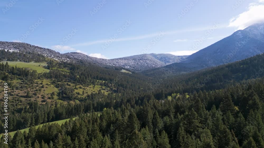 Drone snow dusted mountains in Montana Spring morning Drone snow dusted mountains in Montana Spring morning