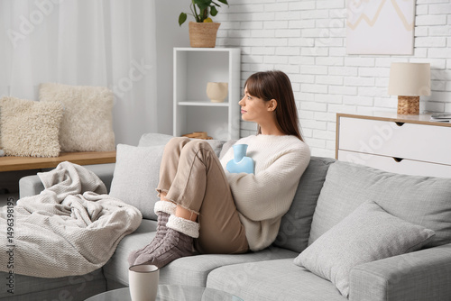 Young woman in warm clothes...