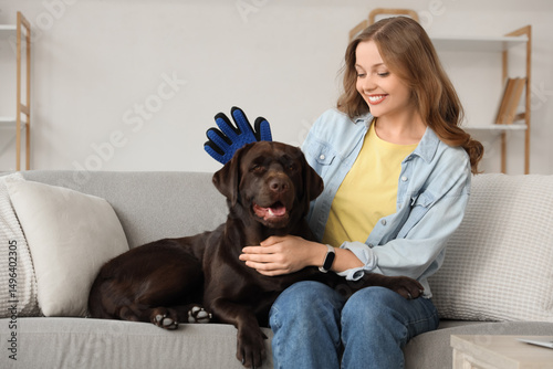 Young woman brushing her cu...