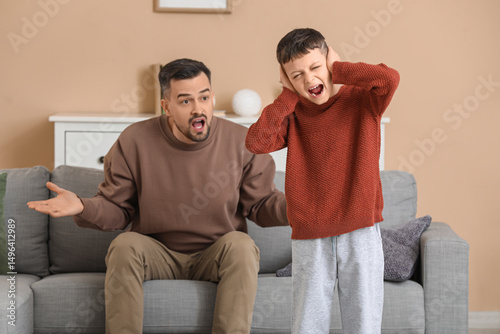 Father with his son coverin...