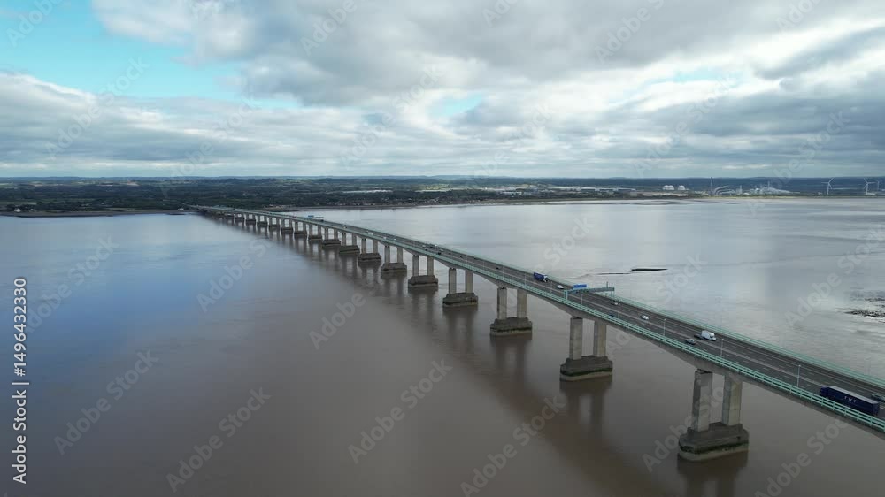 custom made wallpaper toronto digitalAmazing aerial footage of vehicles driving on highway bridge over sea bay. Tracking of passing truck. Prince of Wales Bridge, Wales, UK