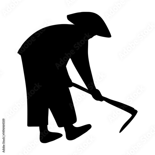Silhouette of a farmer working in the field with a hoe