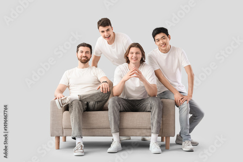 Group of young men in white...
