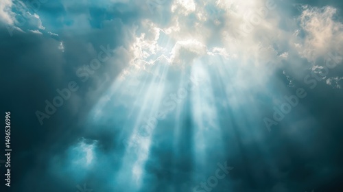 image of light beams breaking through clouds, symbolizing inspiration.