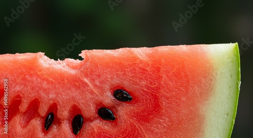 Photo of a Slice of Ripe Red Watermelon