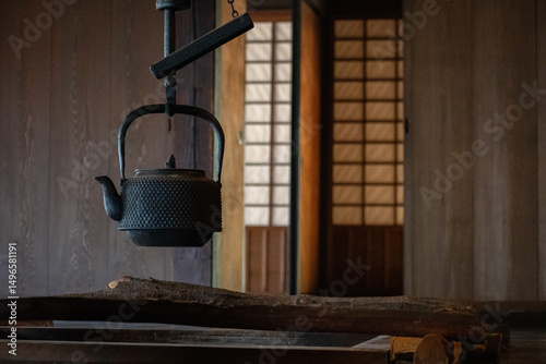 Old Japanese Style Hanging Tea Kettle in Traditional Style House