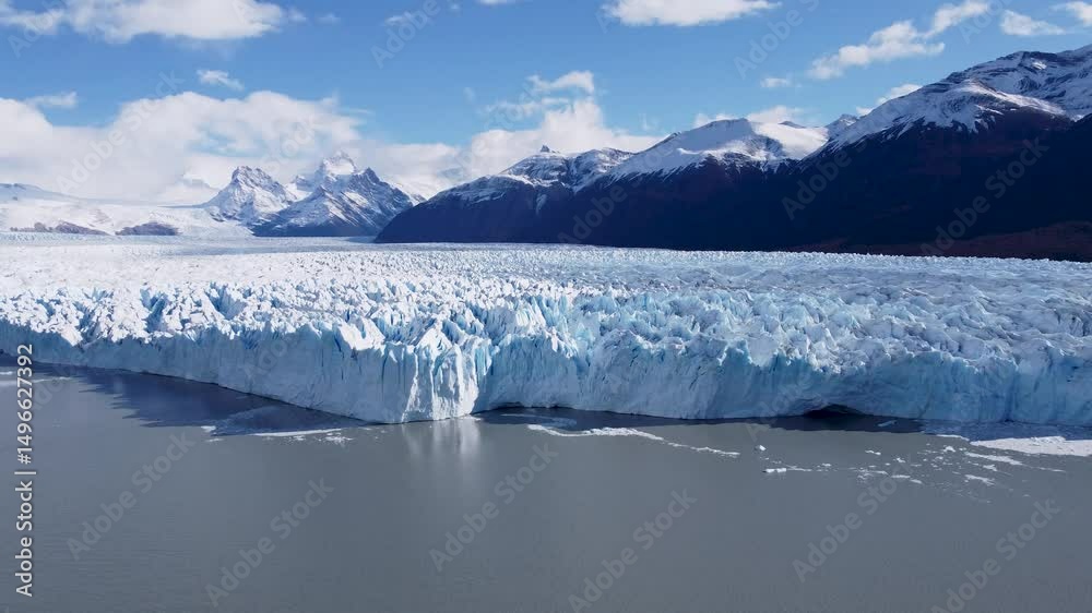 Los Glaciares National Park In El Calafate Santa Cruz Argentina. Glacier Calving Into Icy Lagoon With Snow Capped Mountains. Outdoor Travel Patagonia Glacier. Landmark Patagonia Aerial View Floresta.