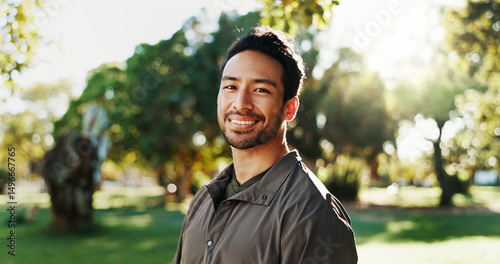 Fitness, man and smile with portrait at park for workout routine, morning cardio and ready for exercise. Space, runner and happy in nature for wellness training, running break and sports confidence