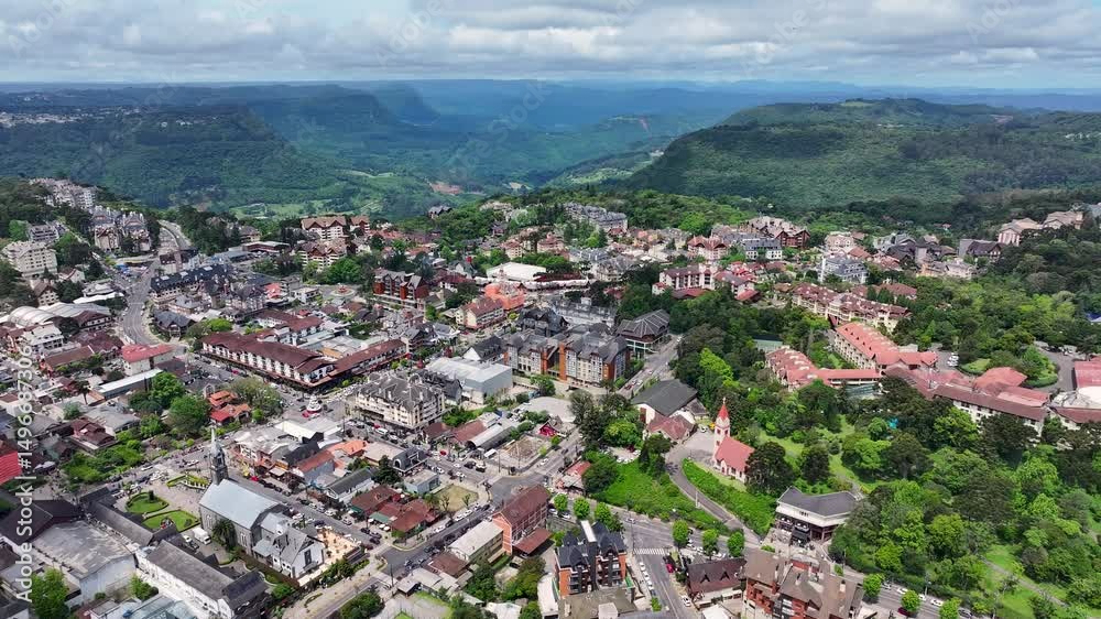 Gramado Skyline In Gramado Rio Grande Do Sul Brazil. Aerial View Of A Bustling City With High-Rise Buildings And Traffic. Business Sky Background Downtown Cityscape. Outdoors Downtown Up Above. Gramado Skyline In Gramado Rio Grande Do Sul Brazil. Aerial View Of A Bustling City With High-Rise Buildings And Traffic. Business Sky Background Downtown Cityscape. Outdoors Downtown Up Above.