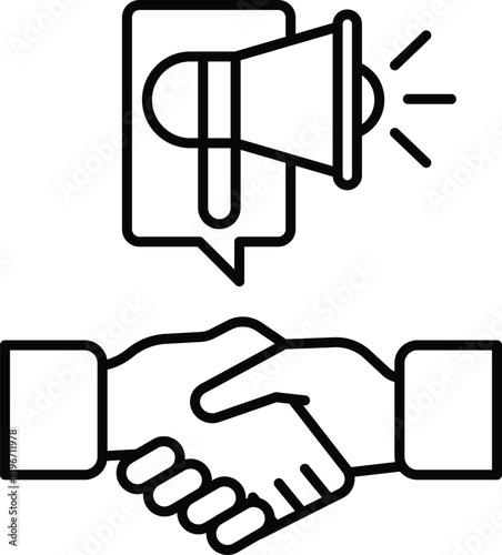A hand shaking another hand with a large speaker in the background