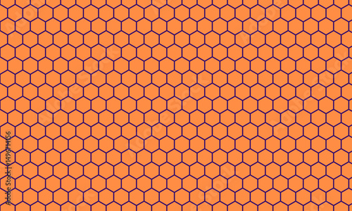 A view of an orange honeycomb pattern, as a background.