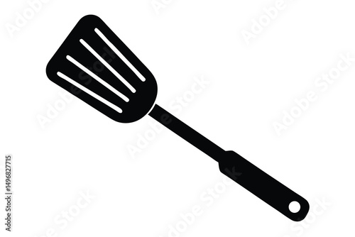 Black plastic cooking spatula isolated on white background