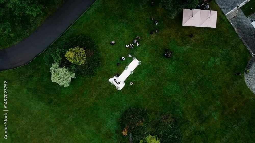 view from a quadcopter of a golf course where an off-site marriage registration is taking place