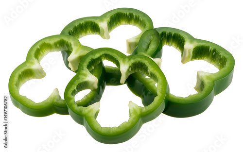 Fresh green bell pepper slices isolated on black