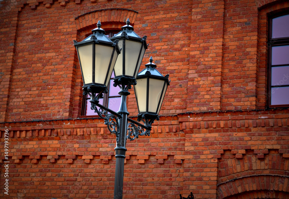 lantern urban market in the city during the day off next to a decorative brick wall