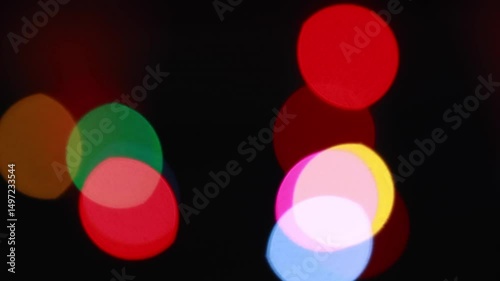 Vibrant Defocused Lights Flicker And Blur Against A Dark Background, Creating A Dynamic Abstract Visual With A Sense Of Mystery And Energy.