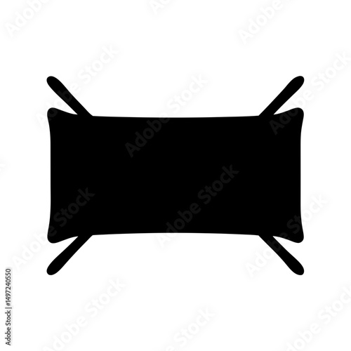 Black silhouette of a rectangular pillow with four visible corner tassels