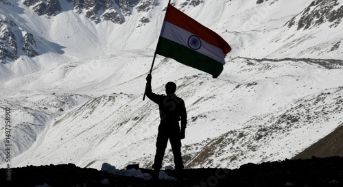 Patriot Standing on Mountain Peak Holding the Indian Flag Amid Snowy Landscape