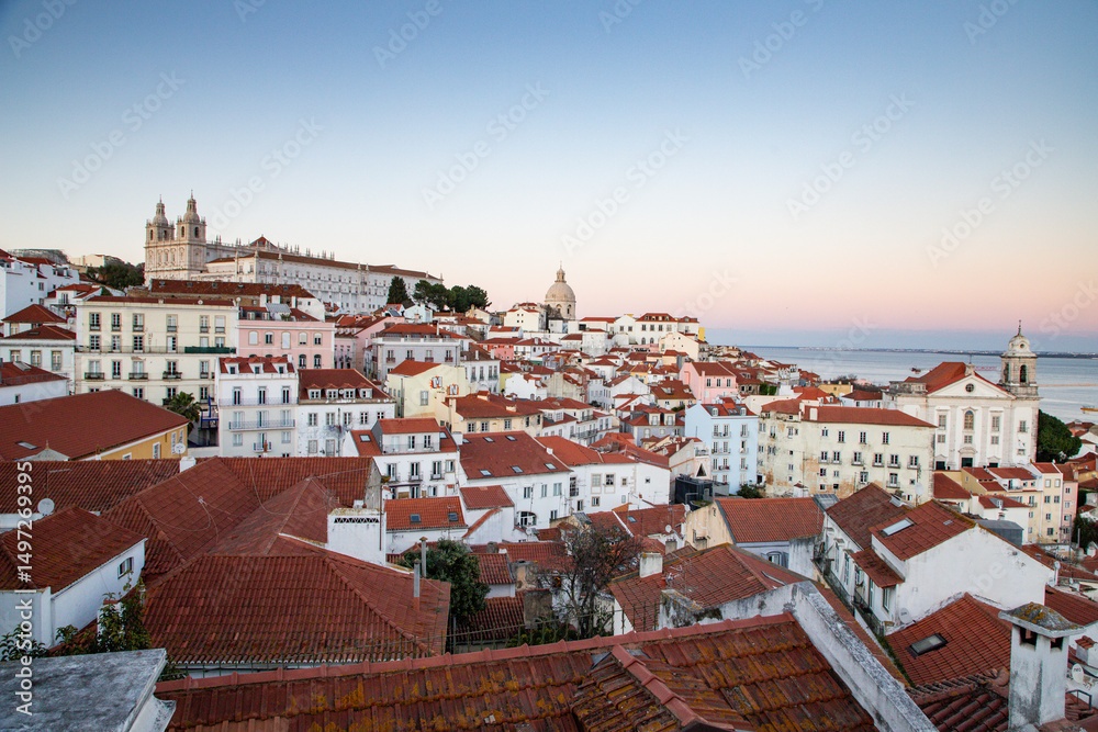 Fototapeta premium panoramic view of skyline of Lisbon city, Portugal, many colorful houses in the Alfama district