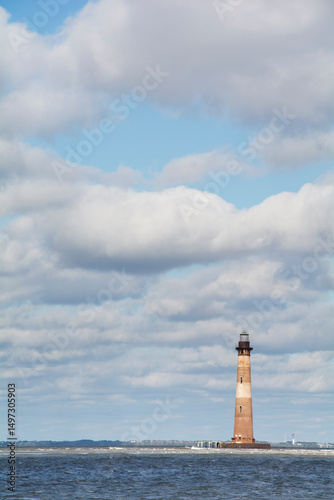 Morris Island Light against cloudy sky