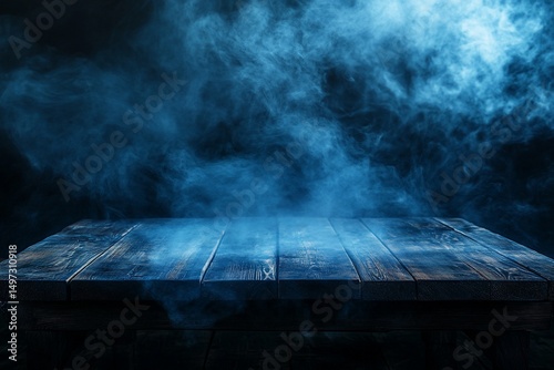 Empty wooden table with blue smoke background for product display photo