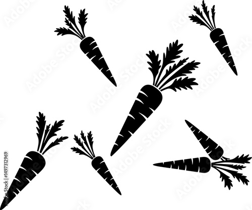 Black silhouette carrots arranged in various positions on white background  
