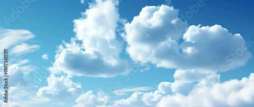 A bright blue sky filled with fluffy white clouds, perfect for nature-inspired themes.