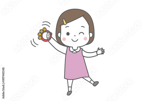 楽しそうに鈴を鳴らす女の子