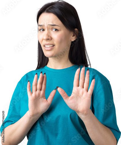 Fotografie Portrait of uncomfortable pretty brunette, raising palms in stop gesture