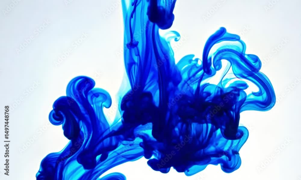 Blue Ink Dropping in Water Slow Motion