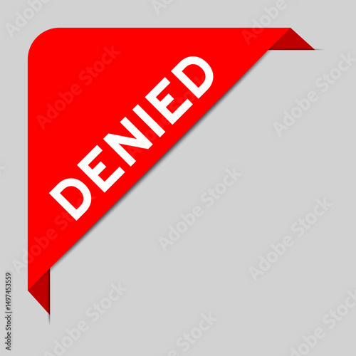 Red color of corner label banner with word denied on gray background