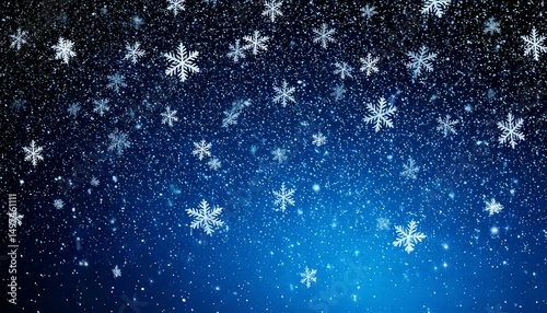 Beautiful winter background image with snowflakes falling on a dark blue night sky. Perfect for Christmas or winter holiday designs.