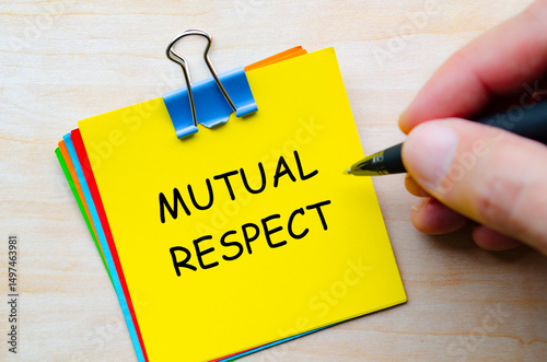 Mutual respect text on yellow sticky notes representing shared responsibility for workplace harmony