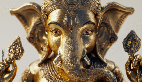 Exquisite brass statue of Lord Ganesha displayed prominently in a serene setting with intricate details shining in natural light