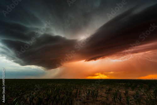 Powerful bolts of lightning flash through spectacular storm clouds, lighting up a dramatic sky filled with shadow, texture, and moody atmosphere, showcasing nature's epic beauty and raw power.