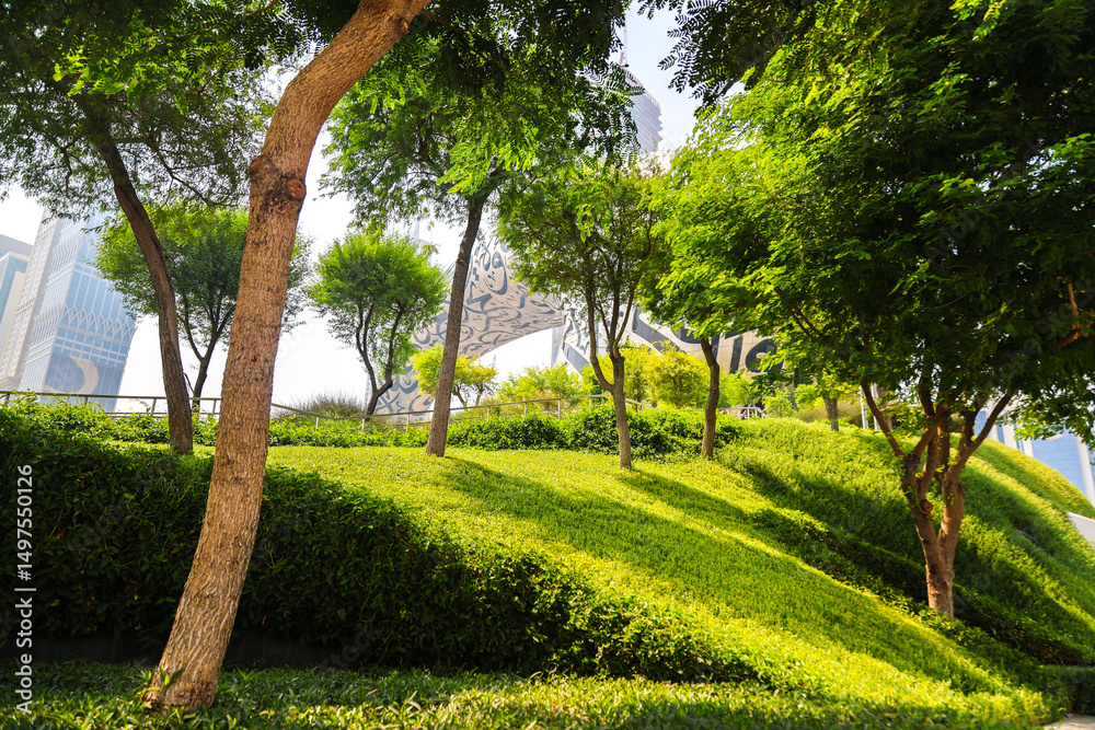 Fototapeta premium Lush Urban Greenery Heat of a Summer Day, Showcasing Nature's Vibrance Amidst Concrete.