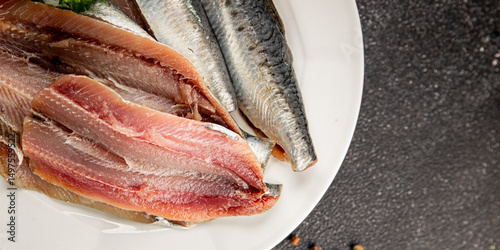 Fotografie Sardine raw fish fillet seafood anchovy filet fresh delicious gourmet food backg