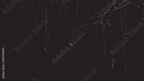 Distressed black surface with vintage scratches. Rough and dirty look adds bold character. Background texture perfect for retro visuals.
