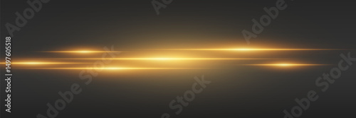 Golden sparkling flashes of light with motion blur, light lines.