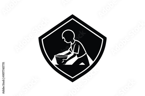 Child silhouette kneeling mixing in bowl shield logo