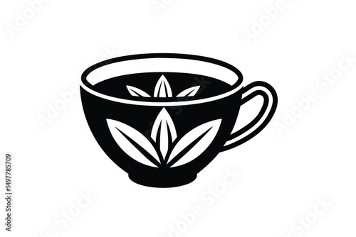 A silhouette of a teacup filled with tea leaves