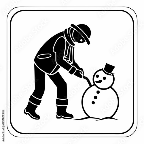 Person building a snowman winter activity snow fun cold weather