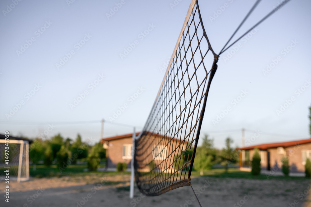 Fototapeta premium volleyball net stretched across a beach volleyball court